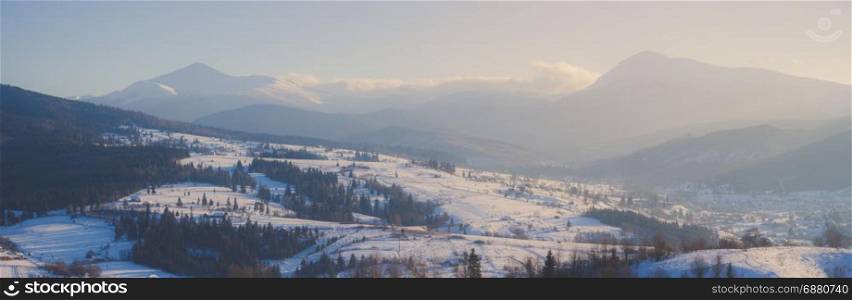 Winter mountain snowy rural sunrise panorama landscape
