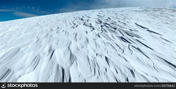 Winter mountain top view on sky with cloud background.