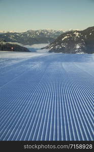 Winter mountains panorama with ski slope