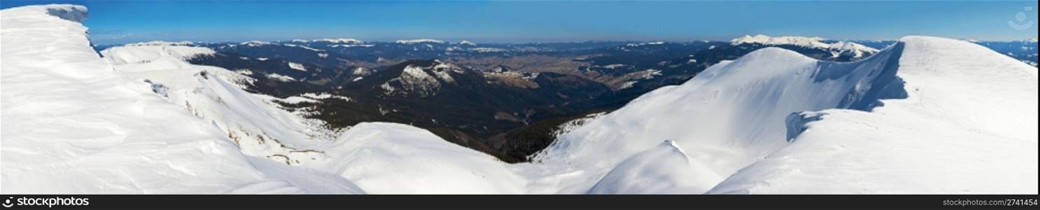 Winter mountains ridge with overhang snow caps (Ukraine, Carpathian Mt&rsquo;s, Svydovets Range, Blyznycja Mount). Fourteen shots stitch image.