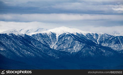 Winter mountains. View from the observation tower of Akhun mountain. Russia