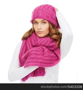 winter, people and happiness concept - woman in pink hat and scarf