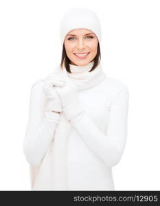 winter, people, happiness concept - woman in hat, muffler and gloves