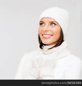 winter, people, happiness concept - woman in hat, muffler and gloves