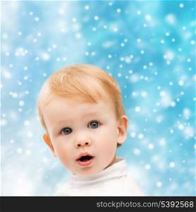 winter, people, x-mas, christmas, happiness concept - - happy little boy in winter clothes