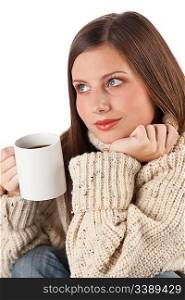 Winter portrait of happy woman holding cup of coffee wearing turtleneck on white