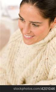 Winter portrait of happy woman wear pullover smiling posing