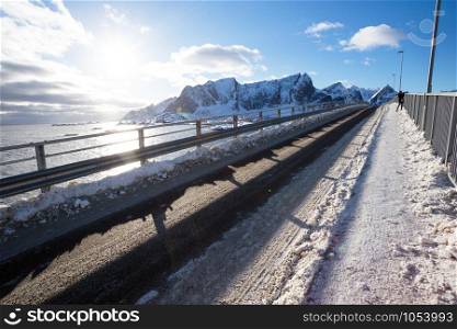 winter road over the bridge at the Lofoten Islands. Norway.