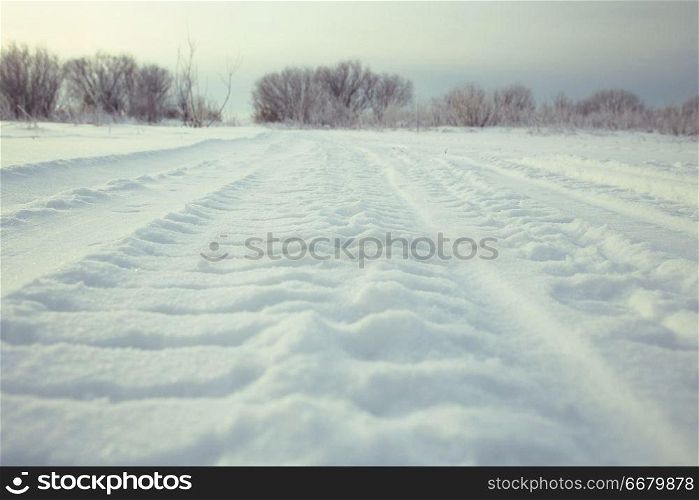 winter road snow tracks