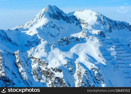 Winter rock top and snow-barries on snowy slopes (Tyrol, Austria).