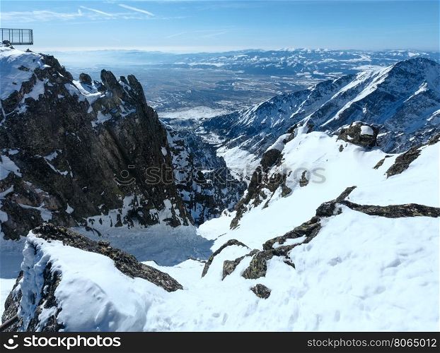 Winter rocky mountain landscape (Tatranska Lomnitsa, High Tatras, Slovakia).