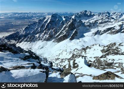 Winter rocky mountain landscape (Tatranska Lomnitsa, High Tatras, Slovakia).