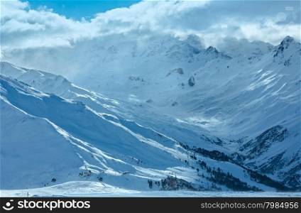 Winter Silvretta Alps landscape and ski track on slope, Tyrol, Austria.