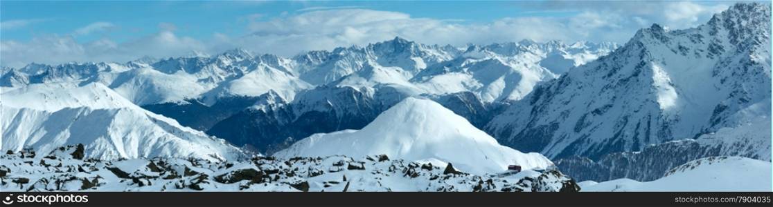 Winter Silvretta Alps landscape. Ski resort Silvrettaseilbahn AG Ischgl, Tirol, Austria. Panorama. All people are unrecognizable.