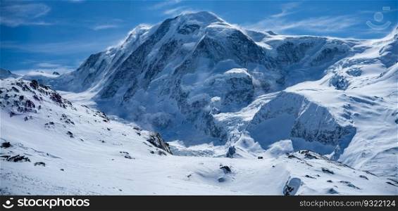 Winter snow covered mountain peaks in Zermatt, Switzerland.