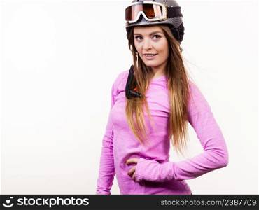 Winter sport hobby people concept. Woman with sporty helmet. Young lady wearing pink clothing.. Woman with sporty helmet.