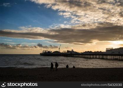 Winter sunset over Brighton Pier on South Coast.