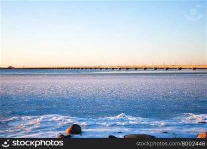 Winter sunshine at the Oland bridge connecting the Swedish island Oland with mainland Sweden