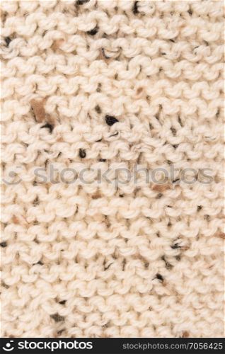 Winter Sweater Design. Grey knitting wool texture background. knitted fabric texture. Knitted jersey background with a relief pattern. Braids in knitting.