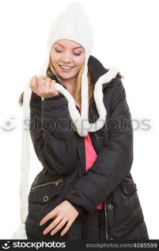 Winter vacation. Cheerful positive girl in warm clothes. Happy young woman doing fun isolated on white.