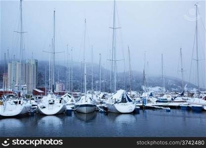 Winter view of a marina in Trondheim at stormy weather
