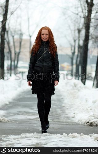 Winter woman in rest snow park