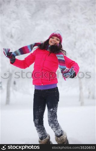 winter women jump in snow