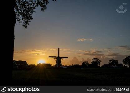 Winterswijk, may 23. Windmill the Batavian with a beautiful cloudy sky in the evening sun