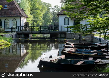 Winterswijk, may 26. Close-up of the historic watermill Den Helder with rowing boats