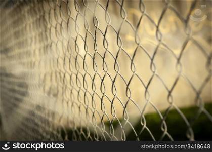 Wire fence (cyclone fencing) in repeating patterns