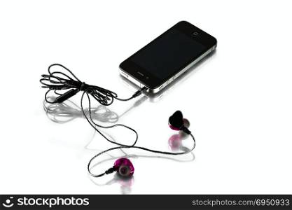 wired HiFi travel headphones and smartphone on white background