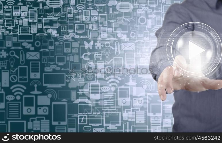 Wireless connection. Close up of businessman touching icon of media screen