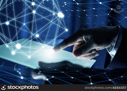 Wireless connection futuristic concept. Businessman hand holding virtual panel representing net connection