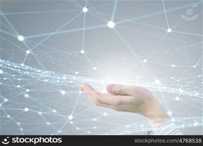 Wireless connection futuristic concept. Businessman hand showing digital connection lines on virtual screen