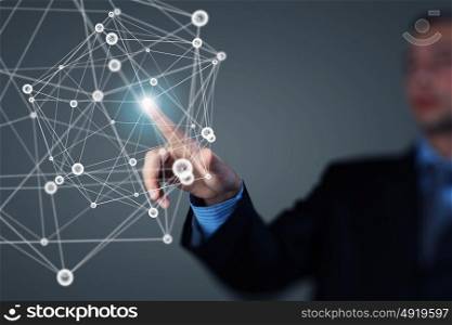 Wireless connection futuristic concept. Businessman hand touching with finger digital connection lines on virtual screen