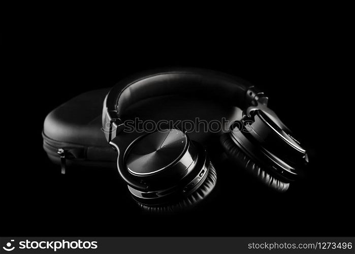 wireless headphones on black background, isolated