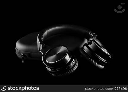 wireless headphones on black background, isolated