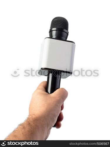 Wireless microphone in hand isolated on white