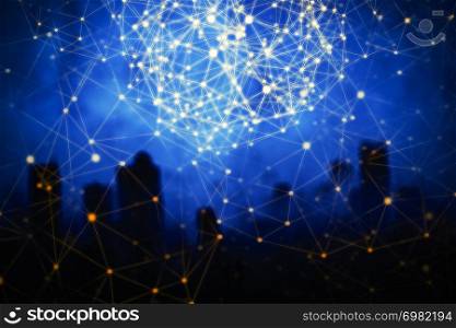 Wireless network connection technology concept. Connection lines and dots over the city at night.