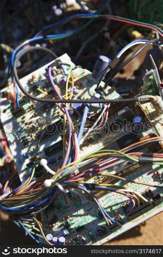 Wires and old broken electrical car components.