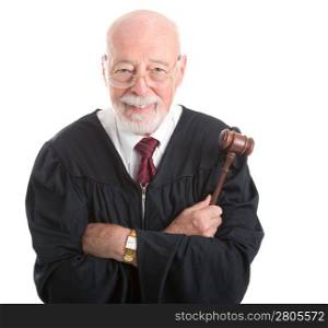 Wise, kind looking judge holding his gavel. Isolated on white background.