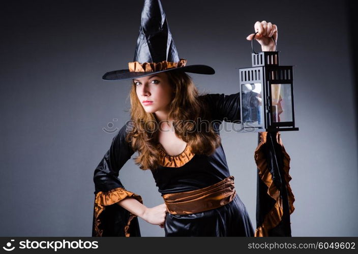 Witch in scary halloween concept