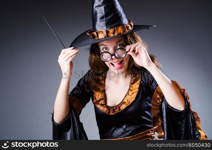 Witch in scary halloween concept