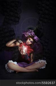 Witchcraft. Fairytale. Enigmatic Magus with Lamp in Darkness