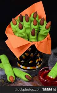 Witches Finger cookies made of shortcrust pastry with almond fingernail. Ideally for a Happy Halloween party