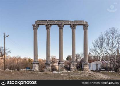 With blue sky,Marble columns of Temple of Tyche, goddess of fortune, Roman, late first century AD, Olba, (Uzuncaburc),Mersin,Turkey. Temple of Tyche, goddess of fortune, Roman in Uzuncaburc
