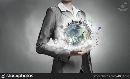 With care and love to our planet. close view of businesswoman holding in hands Earth planet. Elements of this image are furnished by NASA