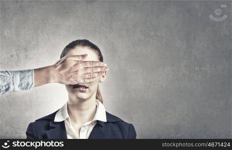 With closed eyes. Portrait of businesswoman and another person closing her eyes with palm