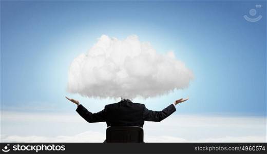 With one&rsquo;s head in clouds. Young businessman with cloud instead of head