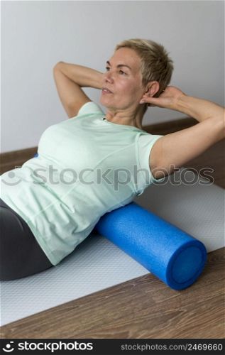 with short hair using yoga mat